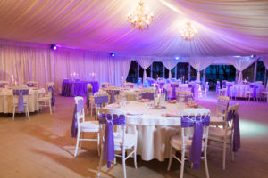 Purple tent lighting for wedding or event