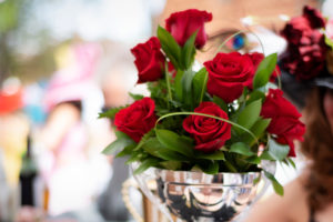Romantic and beautiful red roses in a silver dish for event centerpiece