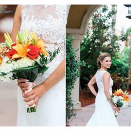 Bride holding a bouquet of tropical flowers in red, orange and white. Flowers by Marco Island Florist.