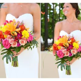 Closeup of bride holding a bouquet of tropical flowers. Tropical wedding flower bouquet design by Marco Island Florist.
