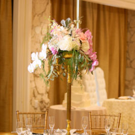 JW Marco Marriott Weddings, Marco Island Wedding Photographers, Gulfside Media Photography Tall wedding reception centerpiece featuring pink and white flowers and greenery. Flowers by Marco Island Florist.