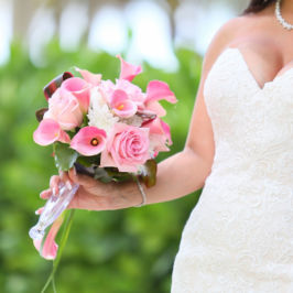 JW Marco Marriott Weddings, Marco Island Wedding Photographers, Gulfside Media Photography Bride holding pink rose and pink calla lily bridal bouquet. Flowers by Marco Island Florist.
